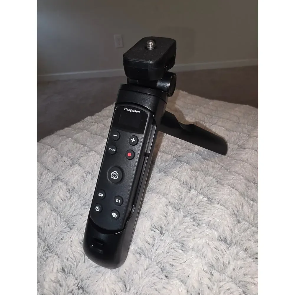 Hanpusen Wireless Remote Control Tripod Grip for Digital Cameras